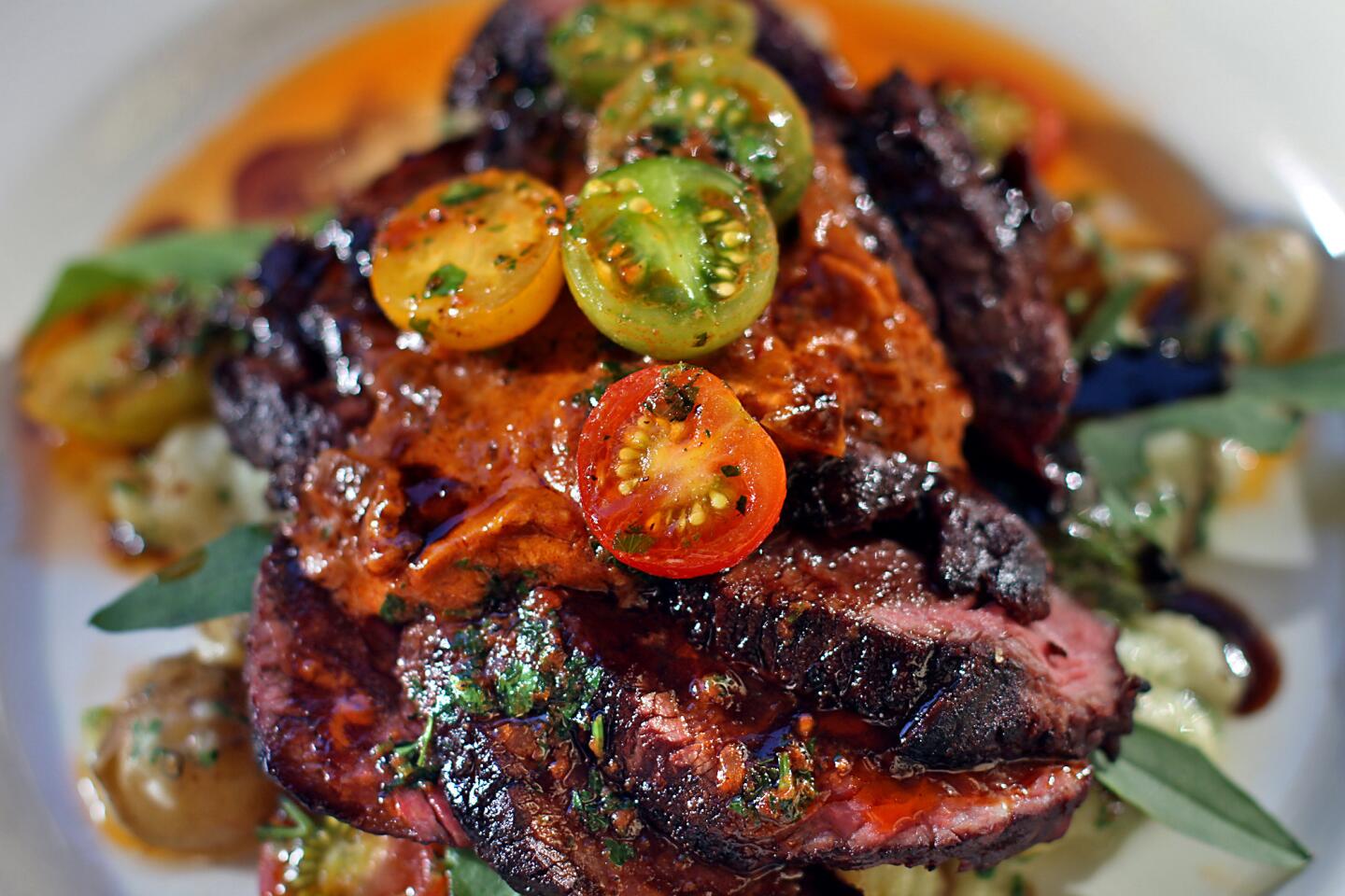 Hanger steak with cherry tomatoes at Lucques.