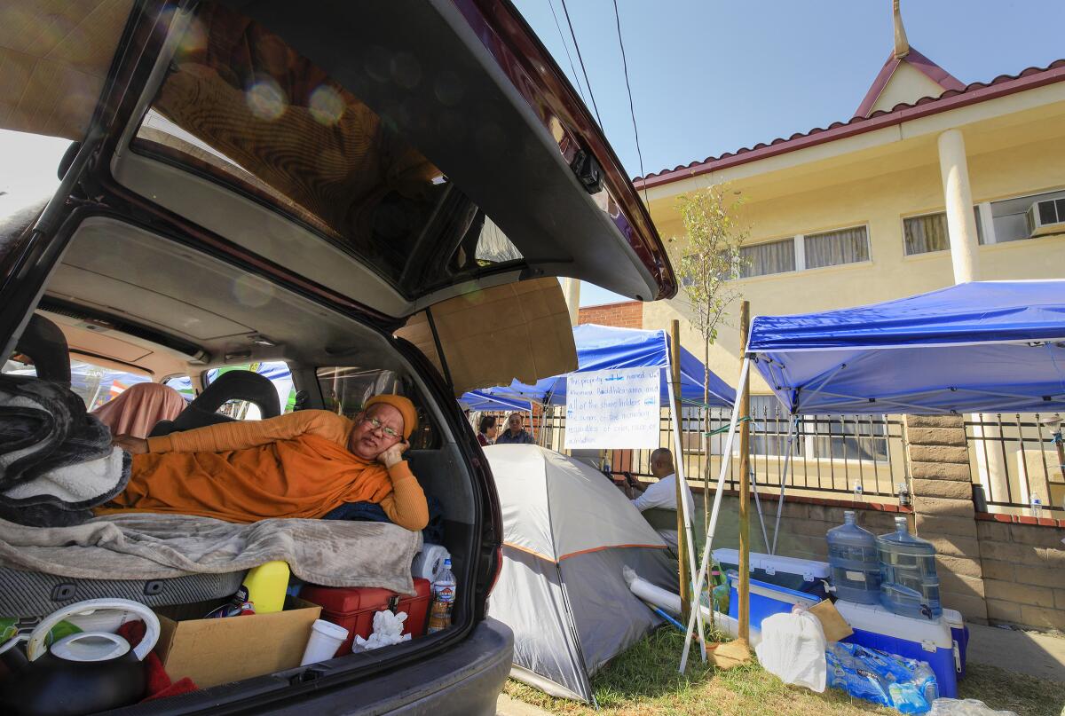 Monk living in car after eviction from Khemara Buddhikarama temple in Long Beach