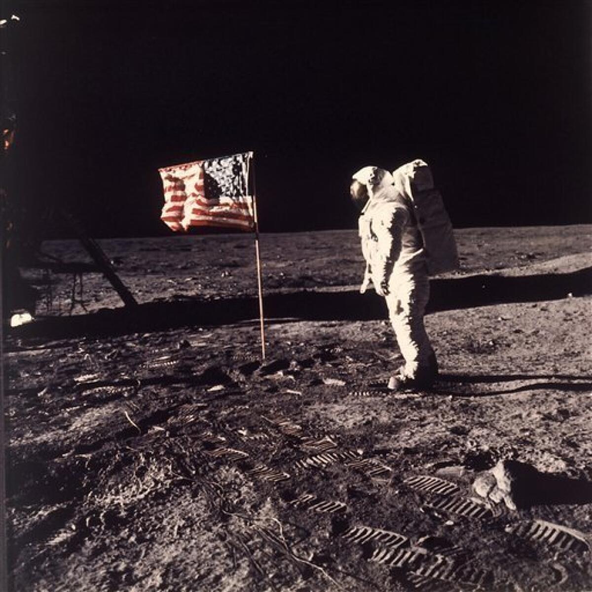 Edwin E. "Buzz" Aldrin Jr. posed for a photograph beside the U.S. flag placed on the moon during the Apollo 11 mission on July 20, 1968. Aldrin and fellow astronaut Neil Armstrong spent nearly three hours walking on the moon, collecting samples, conducting experiments and taking photographs. In all, 12 Americans walked on the moon from 1969 to 1972.