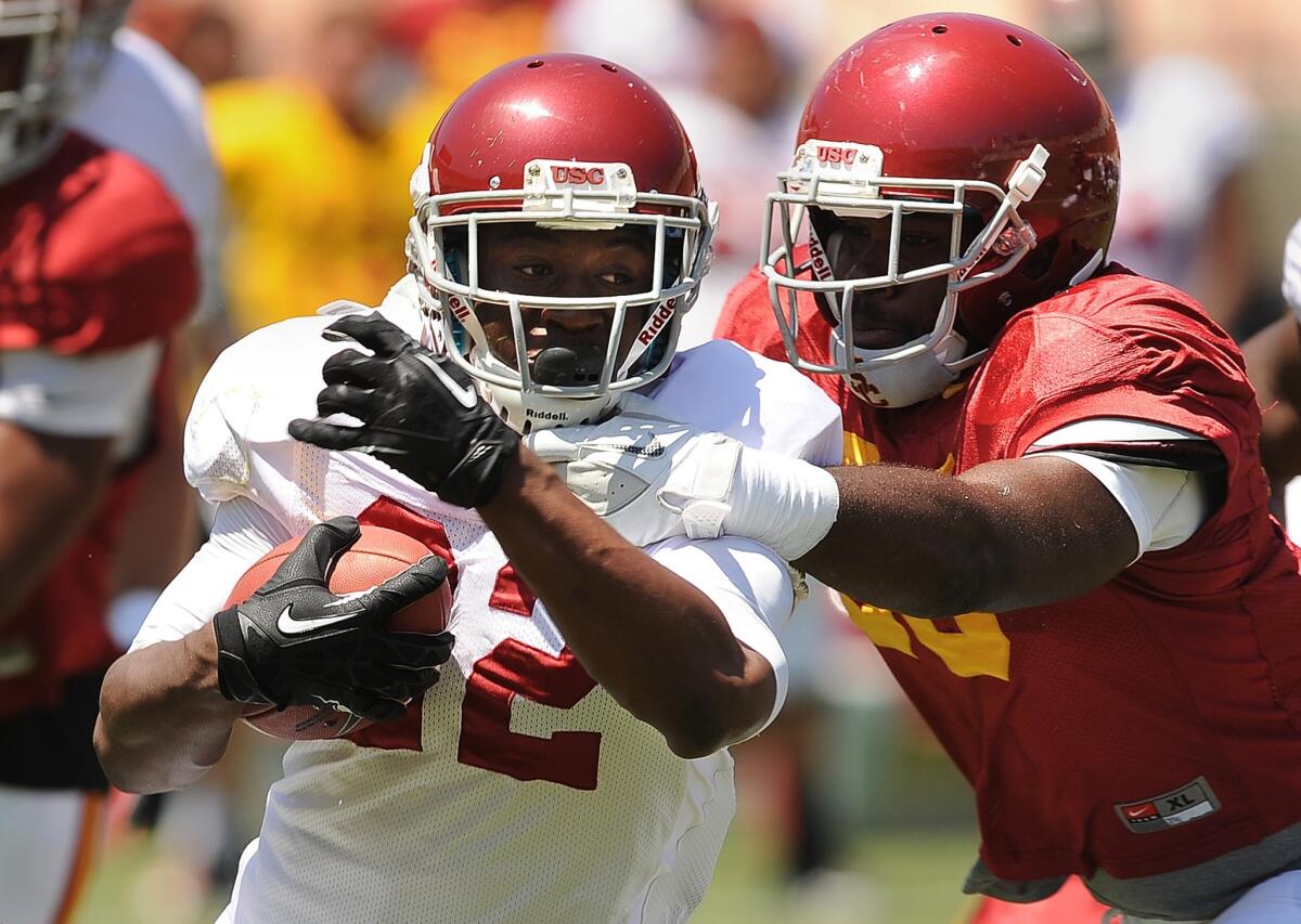 USC freshman running back Justin Davis has made quite an impression with the Trojans' coaching staff.