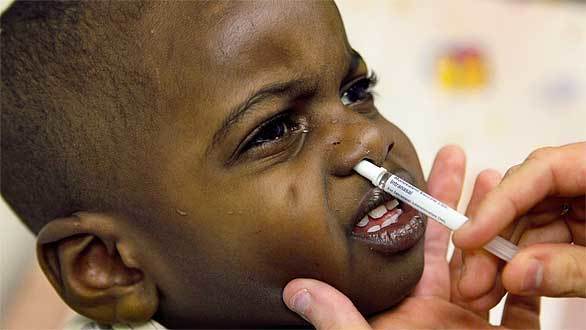 Isiah Harris receives a vaccine at Rush University Medical Center in Chicago, Illinois.