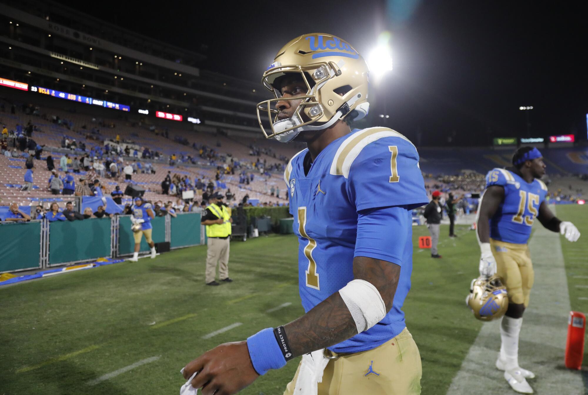 UCLA quarterback Dorian Thompson-Robinson leaves the field after the Bruins' 42-23 loss.