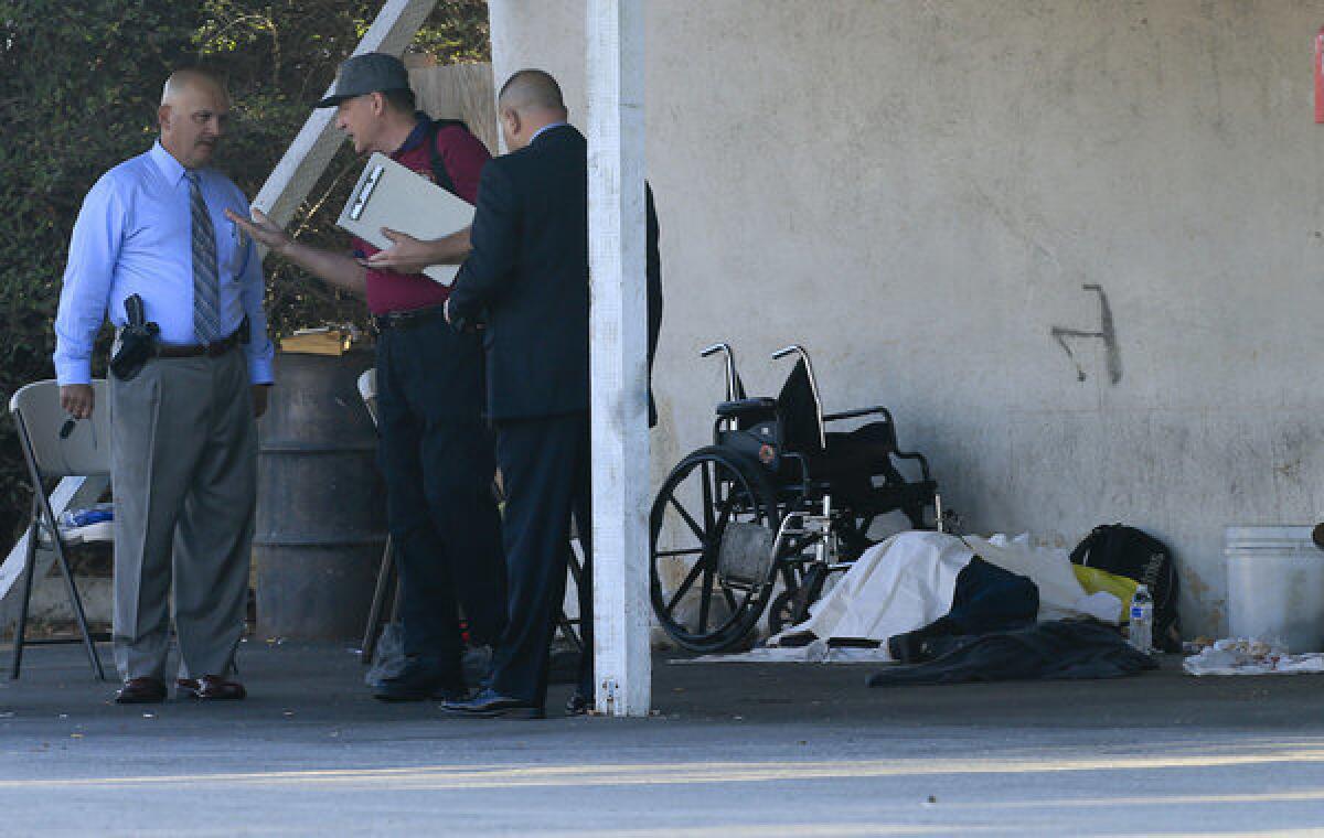 Los Angeles County sheriff's detectives investigate the killing of two men in Glendora. One victim was found under an awning behind a car wash, and the other was found on a sidewalk a short distance away.