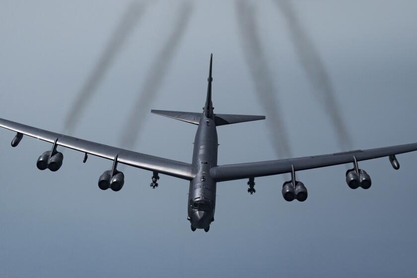 FILE - In this May 21, 2019 photo provided by the U.S. Air Force, a U.S. B-52H Stratofortress, prepares to fly over Southwest Asia. Two American bomber aircraft have flown over a swath of the Middle East, sending what U.S. officials say is a message of deterrence to Iran. The flight of the two massive B-52H Stratofortress bombers over the region on Thursday was the second such mission in less than a month. It was designed to underscore America’s continuing commitment to the Middle East even as President Donald Trump's administration withdraws thousands of troops from Iraq and Afghanistan. (Senior Airman Keifer Bowes/U.S. Air Force via AP)