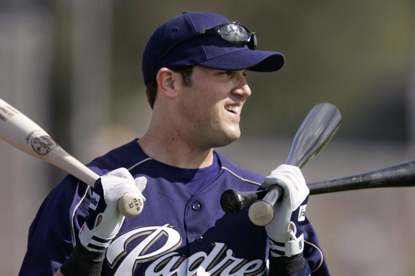 San Diego Padres' Sean Burroughs heads to the batting cage at spring training.