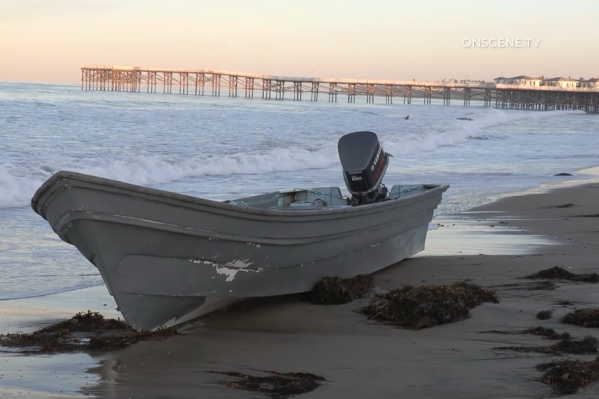 A 20-foot boat believed to be used in a smuggling incident was found abandoned in Pacific Beach early Monday.