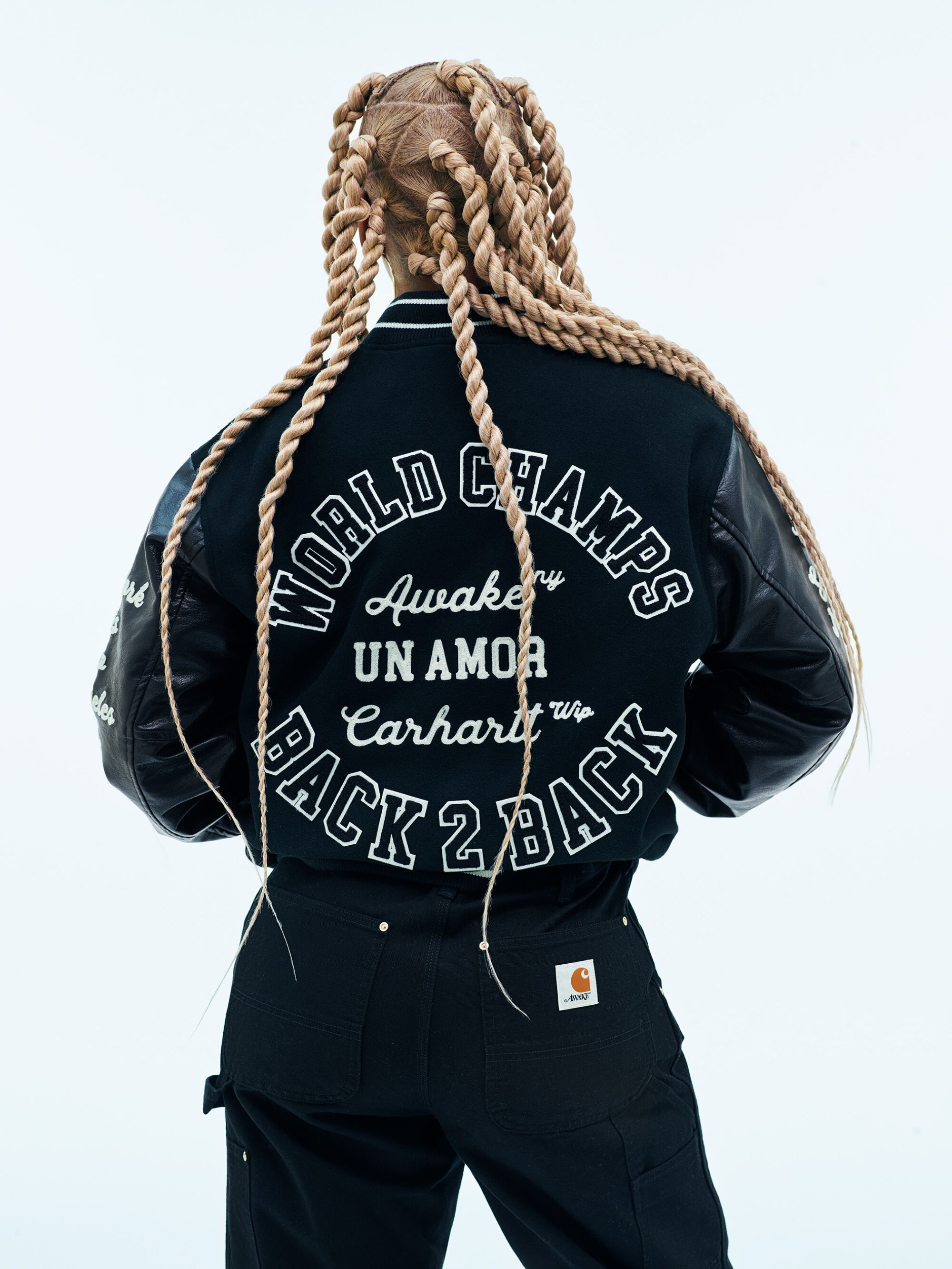 Photo of model wearing Carhartt WIP x Awake NYC collaboration.