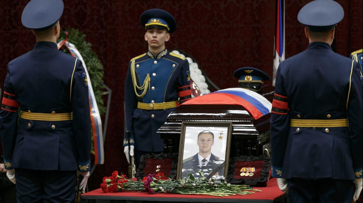 More than 30,000 people attended the funeral on Feb. 8, in Voronezh, Russia, for Roman Filipov, an Su-25 jet pilot who died in action in Syria.