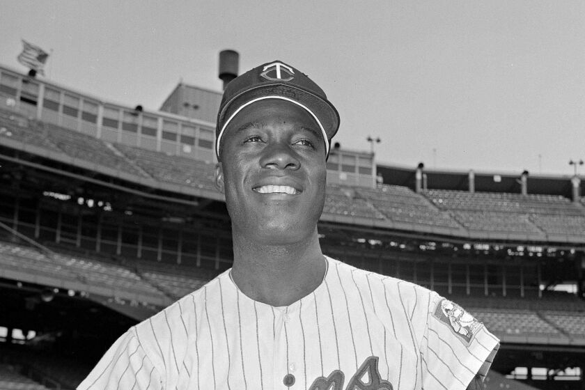 In this June 21, 1964, file photo, Minnesota Twins pitcher Jim "Mudcat" Grant poses.