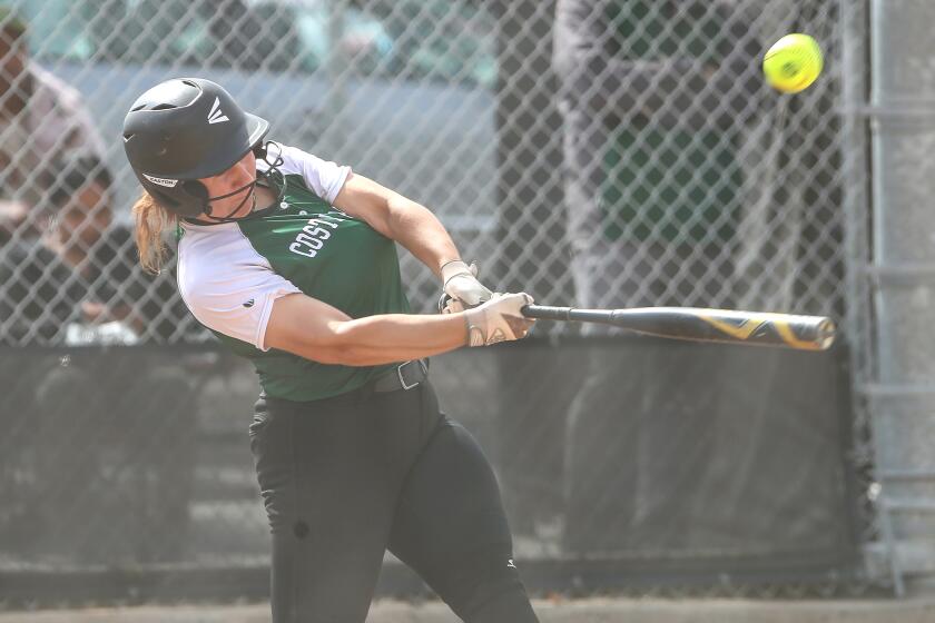 Costa Mesa's Sydnie Pulido hits a single in the first round of the CIF Southern Section Division 6 softball playoffs against Pasadena Mayfield on Thursday.