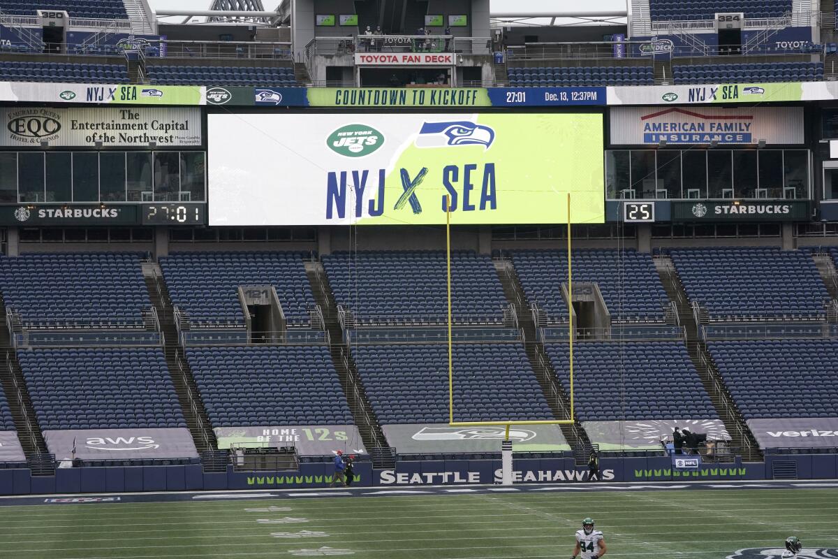 Seats at Lumen Field in Seattle are empty shortly before the Seahawks played the New York Jets on Dec. 13, 2020.