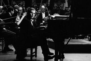 LEANARD BERNSTEIN CONDUCTING THE NEW YORK PHILHARMONIC ORCHESTRA. Glenn Gould at the piano. Image dated January 4, 1960. (Photo by CBS Photo Archive/Getty Images)