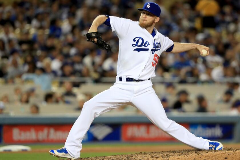 Dodgers pitcher J.P. Howell pitches in relief during the eighth inning of a game against the San Francisco Giants at Dodger Stadium on April 16.