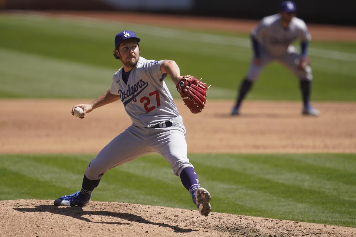 Dodgers pitcher Trevor Bauer prepares to deliver a pitch