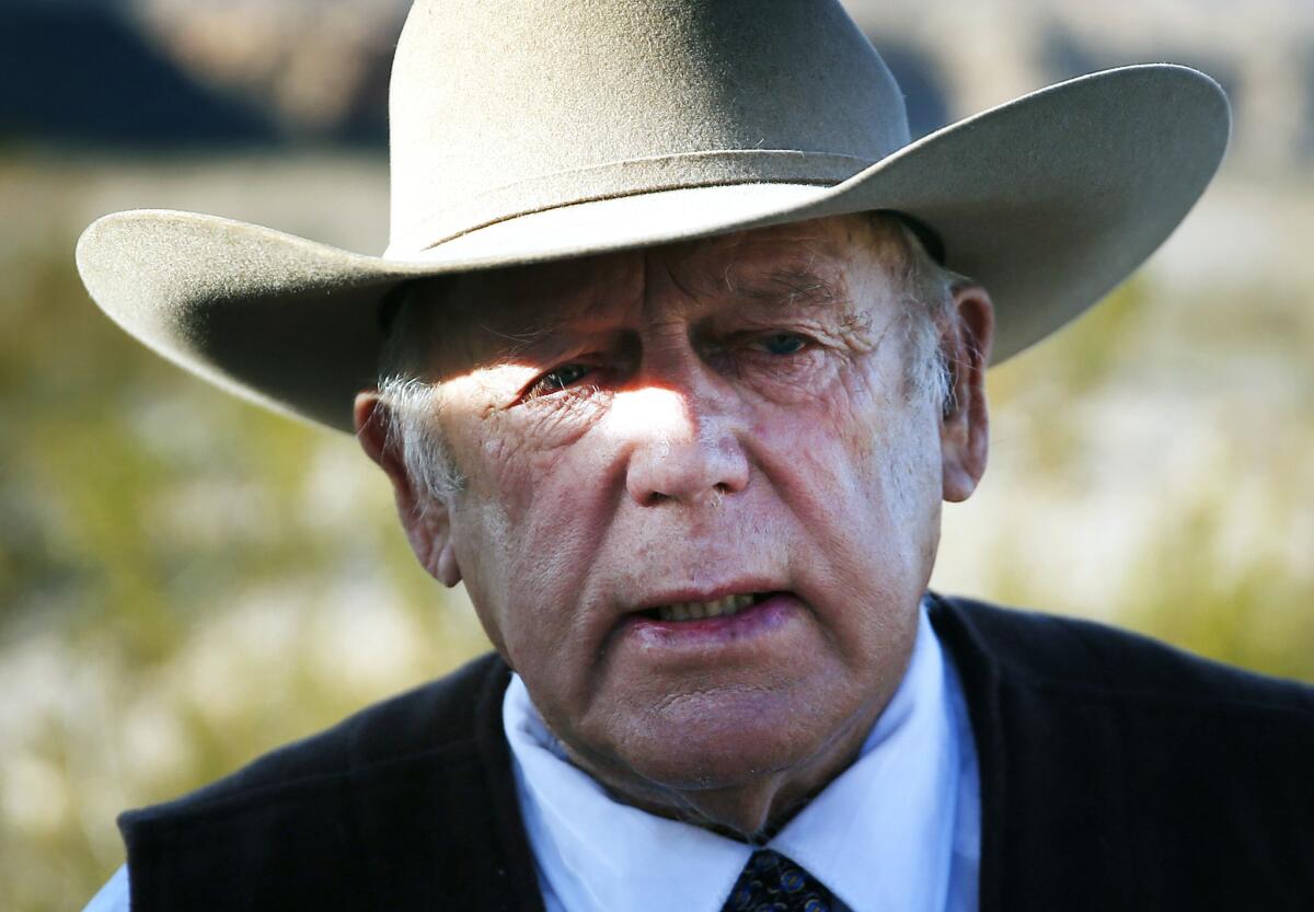 Rancher Cliven Bundy speaks to the media near his ranch in Bunkerville, Nev., on Jan. 27, 2016.