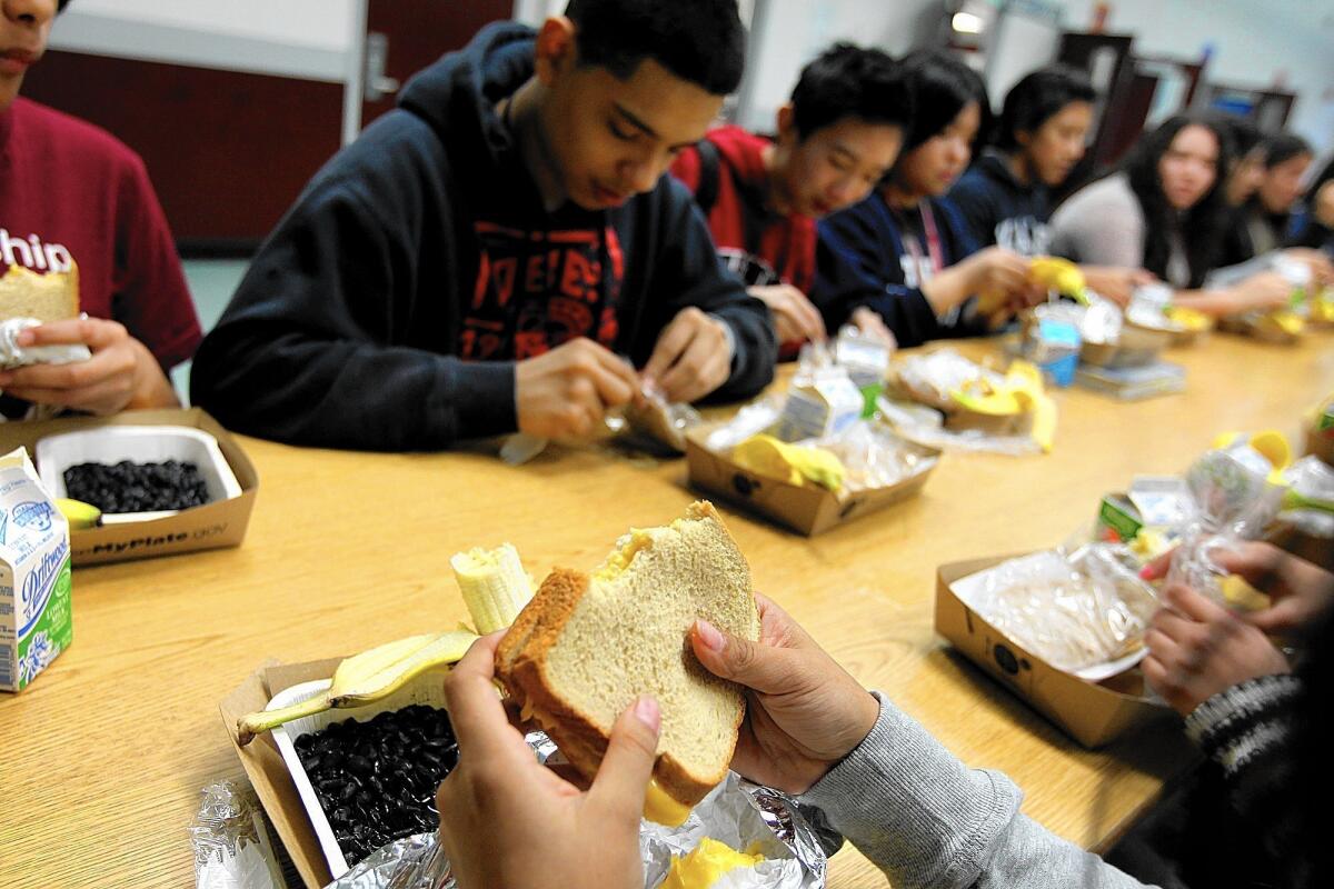 Students eat lunch at Francisco Bravo Medical Magnet High School in Los Angeles.