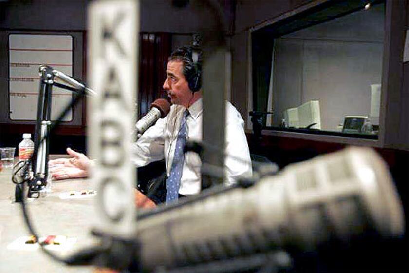 'TOP GUN' ATTORNEY: Myles L. Berman, 50, speaks on the Al Rantel radio show on KABC-AM (790). The DUI lawyer's barky ads, which are a staple on Los Angeles radio talk shows, feature his firm's motto, "Friends dont let friends plead guilty."