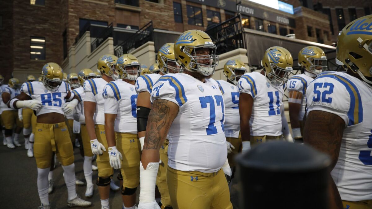 UCLA Bruins offensive lineman Andre James (77) warms up before a Sept. 28 game against Colorado in Boulder.
