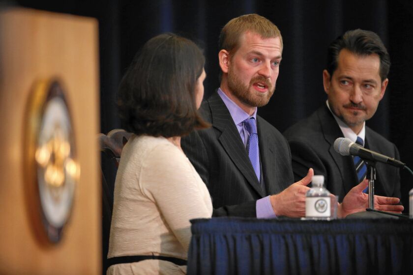 Ebola survivor Dr. Kent Brantly, center, was treated at one of four U.S. facilities able to handle such patients. Now 35 hospitals are equipped to take care of Ebola patients.