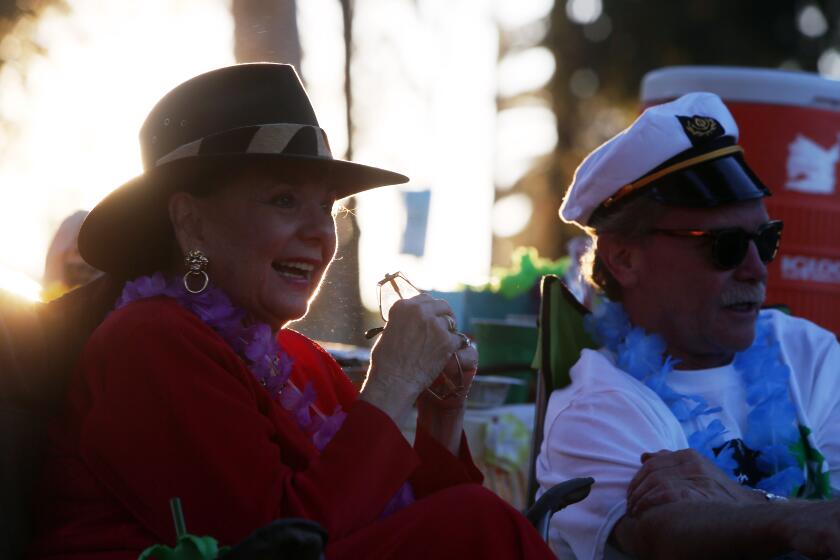 LOS ANGELES, CA-AUGUST13, 2019: Dawn Wells of Gilligan's Island fame, left, and Chris Erskine, right, talk during a pop-up tiki party on August 13, 2019 at Echo Park Lake, Los Angeles, California. (Photo By Dania Maxwell / Los Angeles Times)