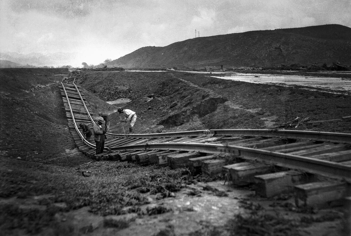 March 13, 1928: Railroad tracks at Castaic were left sagging and twisted after the collapse of the St. Francis Dam.