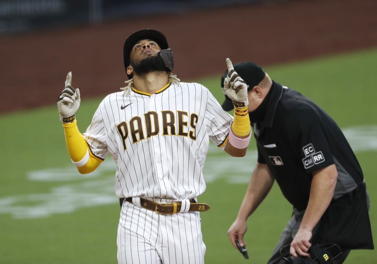 The Padres' Fernando Tatis Jr. celebrates a solo home run.