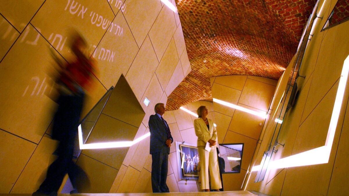 Visitors walk through the Jewish Museum in Copenhagen in 2004.