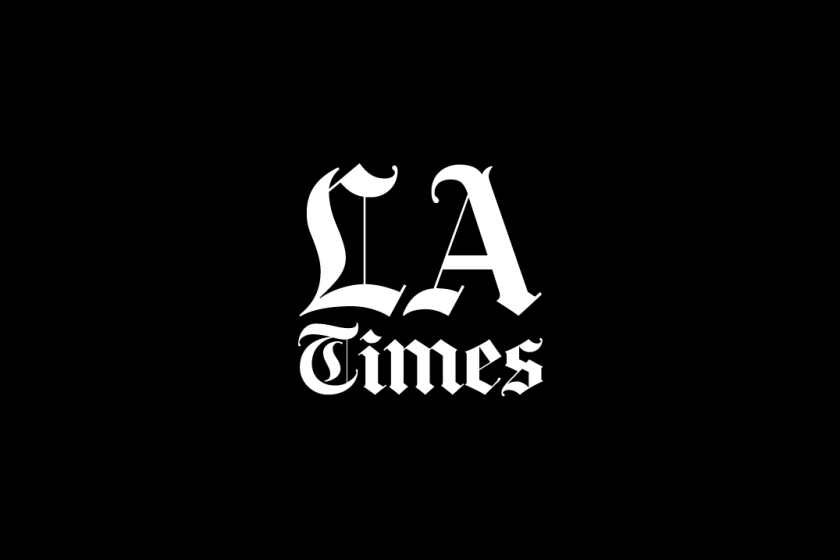 black background with white text that reads "LA Times"