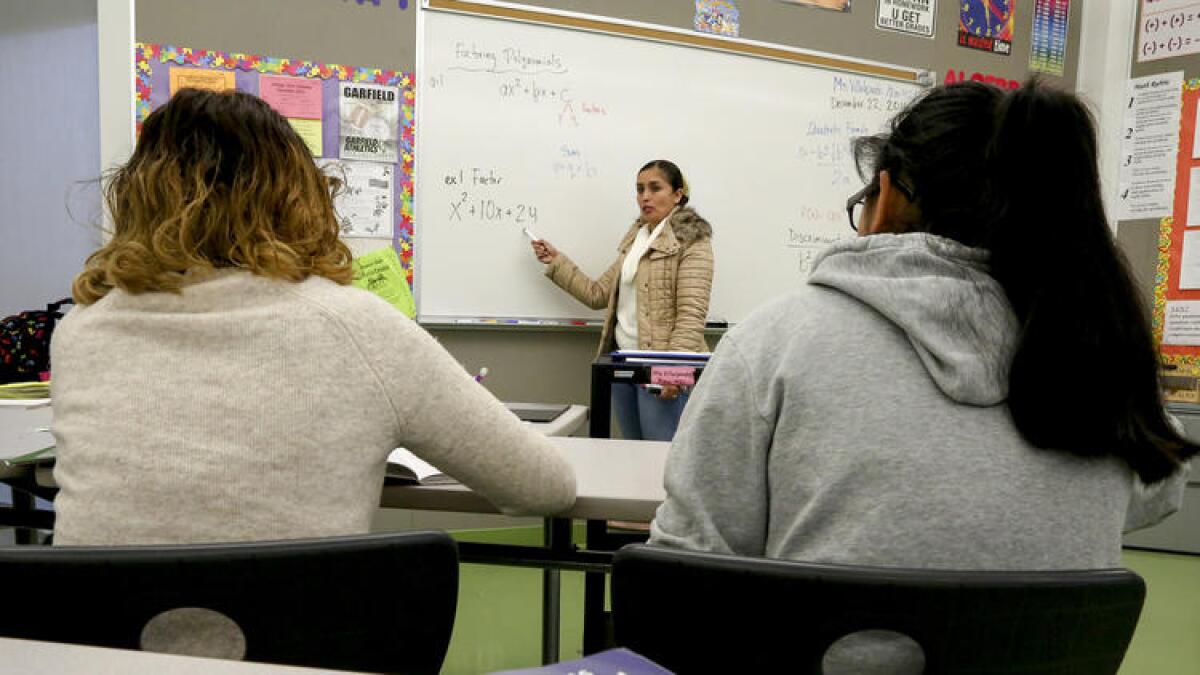 Math teacher Liliana Villalpando leads her students through a course at Garfield High School.