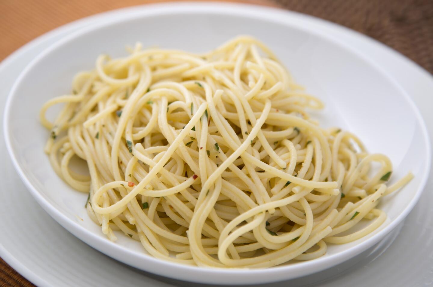 The simple pasta dish aglio e olio is made with olive oil, garlic, lemon, pepper flakes and parsley. Evan Kleiman, who ran Angeli Cafe for 27 years, shares her technique.