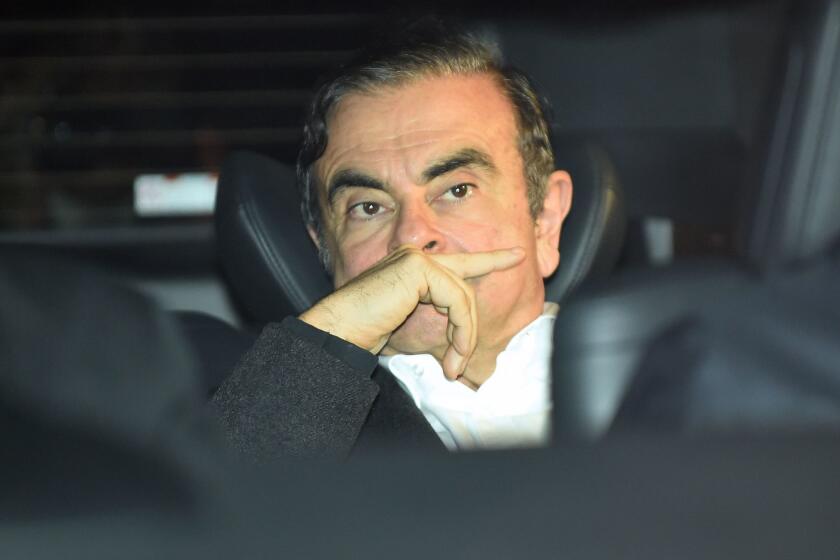 TOPSHOT - Former Nissan chairman Carlos Ghosn leaves his lawyers' offices after he was released earlier in the day from a detention centre after posting bail in Tokyo on March 6, 2019. - Ghosn posted bail of 1 billion yen (9 million USD) in cash on March 6, paving the way for his release from the Tokyo detention centre after more than three months in custody. (Photo by Kazuhiro NOGI / AFP)KAZUHIRO NOGI/AFP/Getty Images ** OUTS - ELSENT, FPG, CM - OUTS * NM, PH, VA if sourced by CT, LA or MoD **