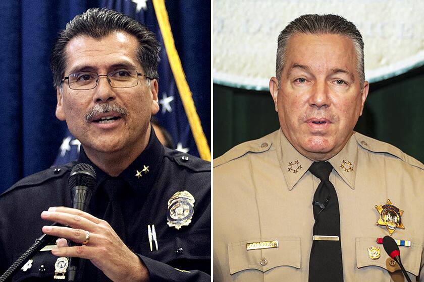 Retired Long Beach Police Chief Robert Luna and Los Angeles County Sheriff Alex Villanueva.
