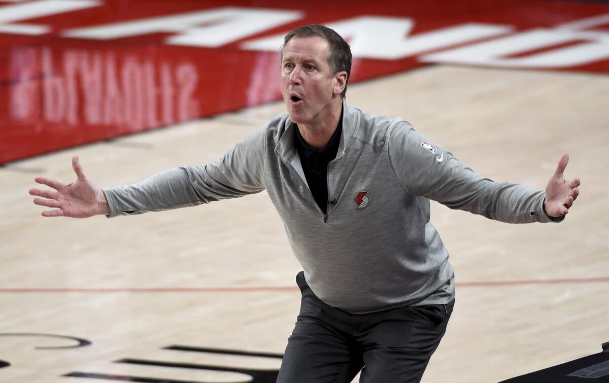 Portland Trail Blazers head coach Terry Stotts reacts to an official's call during the first half of Game 4 of an NBA basketball first-round playoff series against the Denver Nuggets in Portland, Ore., Saturday, May 29, 2021. (AP Photo/Steve Dykes)