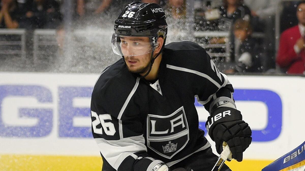 Kings defenseman Slava Voynov skates during the third period against the St. Louis Blues at Staples Center on Oct. 16, 2014. An arbitrator has upheld Voynov's one-season suspension by the NHL but is giving him credit for serving half of it in 2018-19.