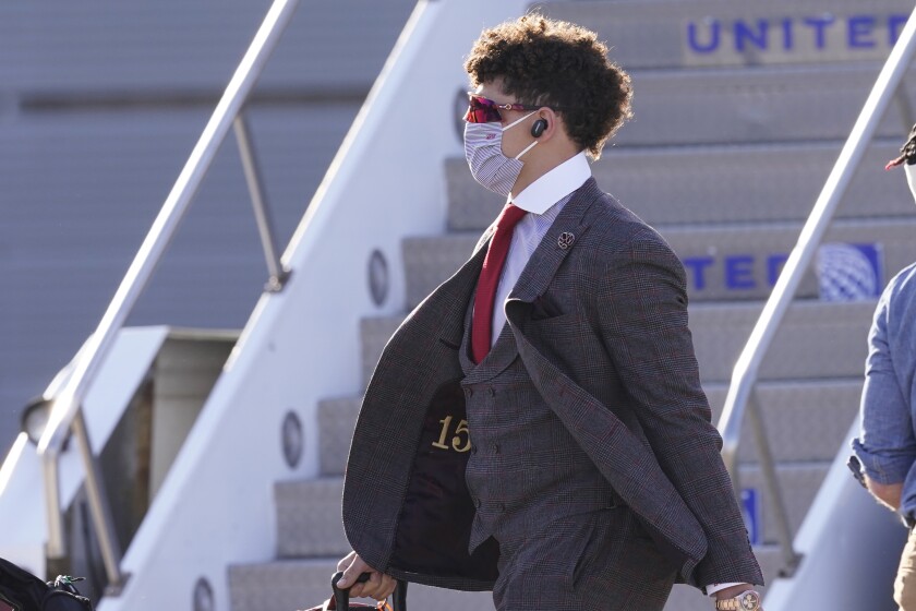 Kansas City Chiefs quarterback Patrick Mahomes arrives for the NFL Super Bowl 55 football game against the Tampa Bay Buccaneers, Saturday, Feb. 6, 2021, in Tampa, Fla. (AP Photo/Charlie Riedel)