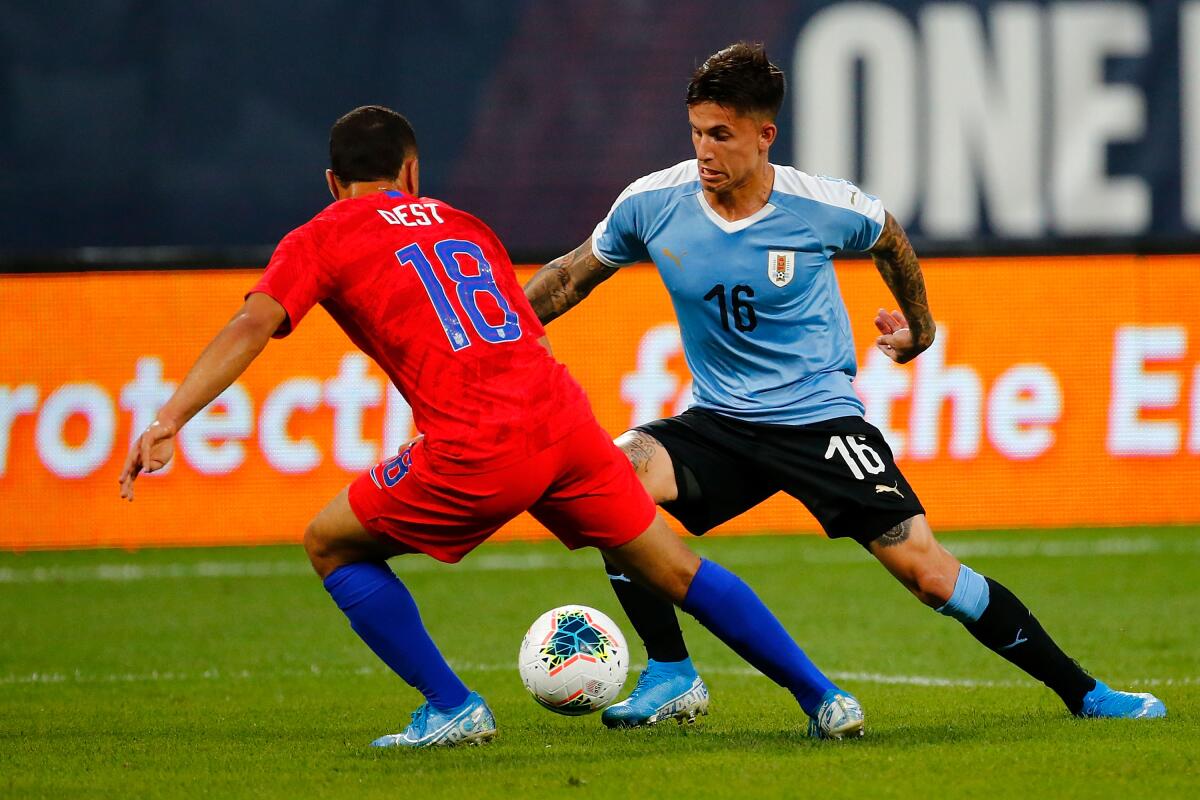 Uroguay's Brian Rodriguez controls the ball against Sergiño Dest #18 of the U.S. on Sept. 10 in St. Louis. Rodriguez, an 18-year-old winger, could play for LAFC on Saturday.