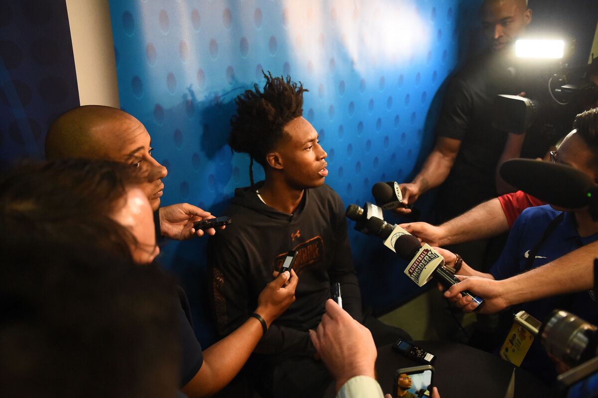 Collin Sexton speaks with reporters during the NBA combine on Thursday at Quest MultiSport Complex in Chicago.