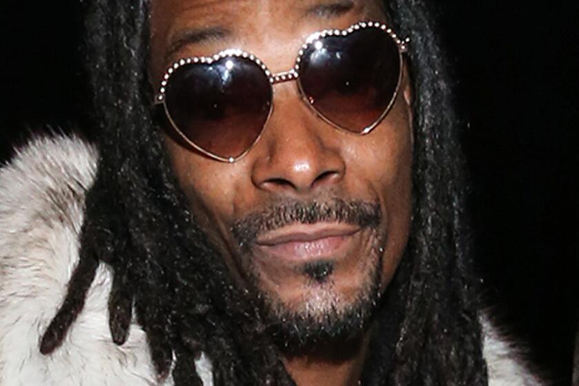 Snoop Dogg is a grandfather at 43.