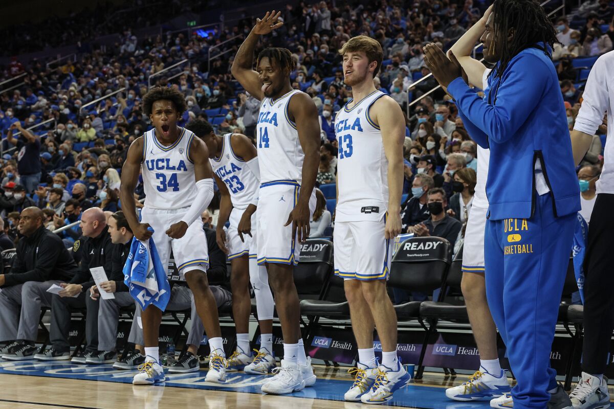 UCLA players celebrate during a win over Stanford on Saturday