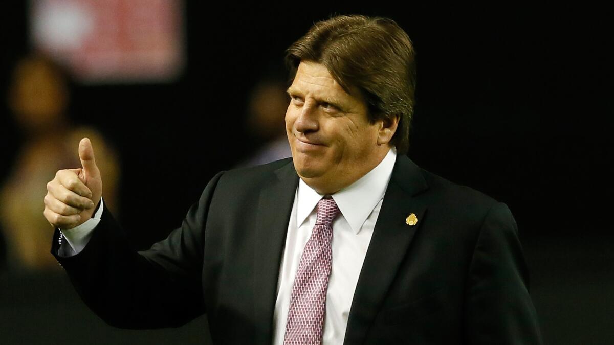 Mexico Coach Miguel Herrera gestures before a match against Nigeria in March. Herrera has big expectations for Mexico in the World Cup.