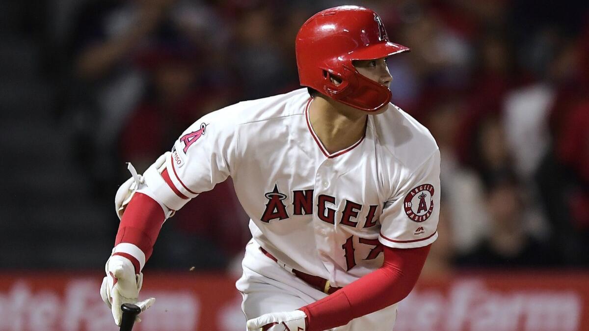 Shohei Ohtani hits a single against the Kansas City Royals on May 17.