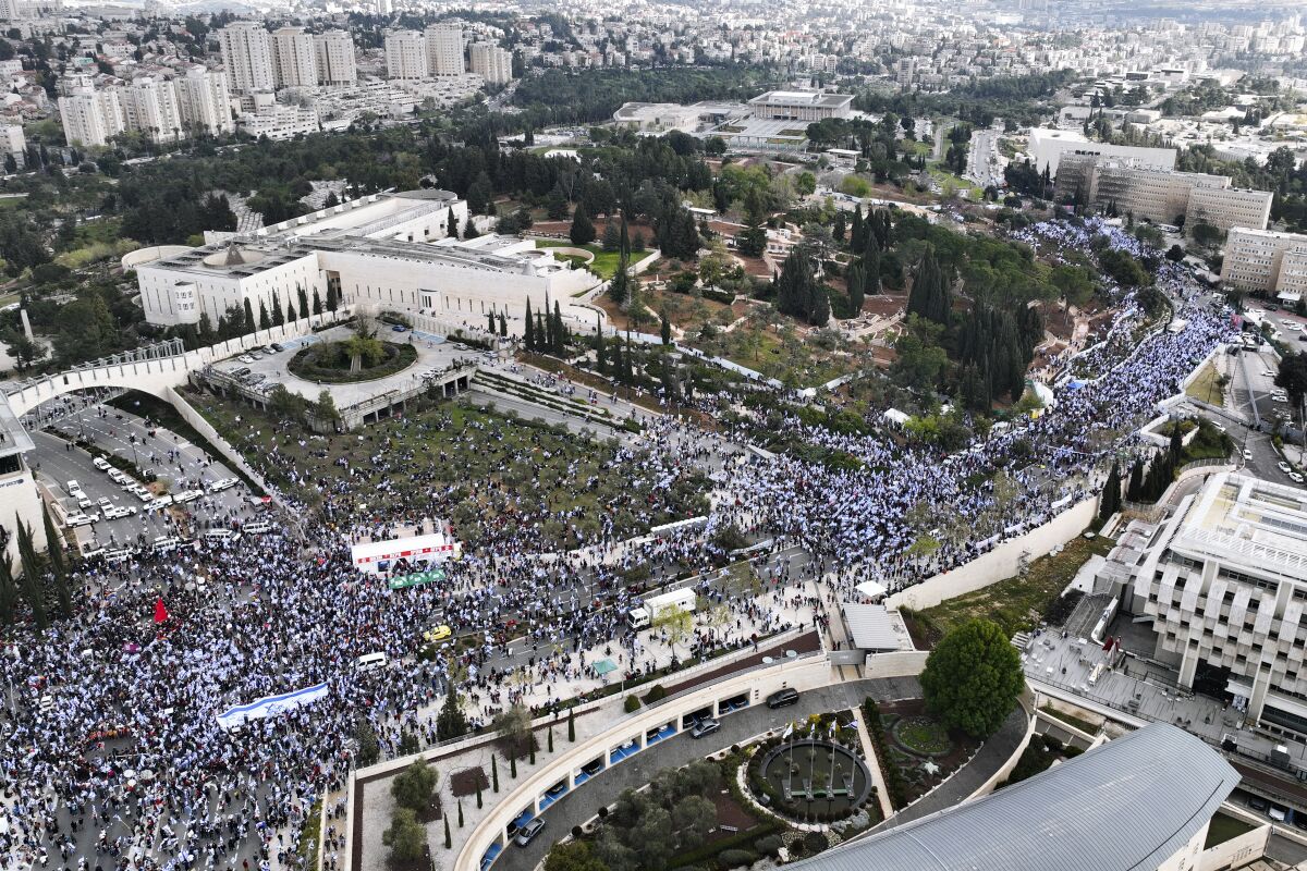 Tens of thousands Israelis protest against Prime Minister Benjamin Netanyahu's judicial overhaul plan outside the parliament in Jerusalem, Monday, March 27, 2023. (AP Photo)