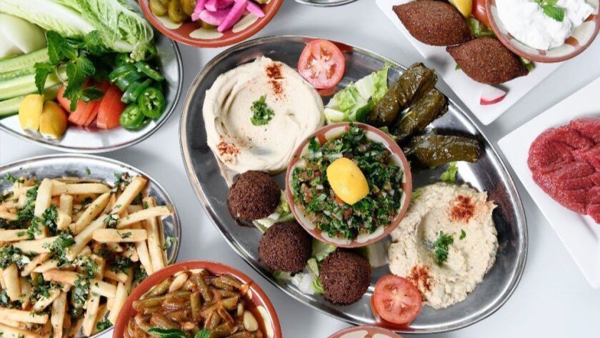 A feast at Hayat's Kitchen often includes falafel, hummus and beef specialties.