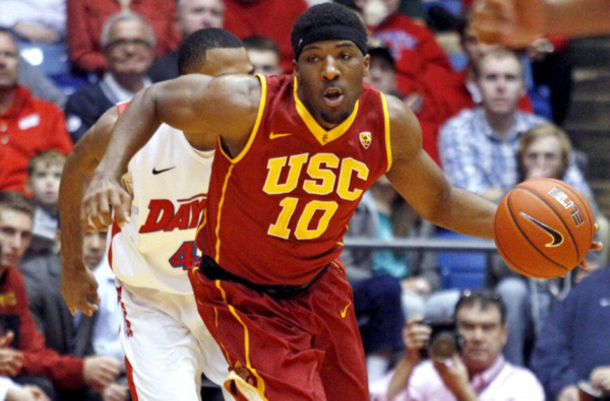 USC guard Pe'Shon Howard heads up court after making a steal against Dayton.