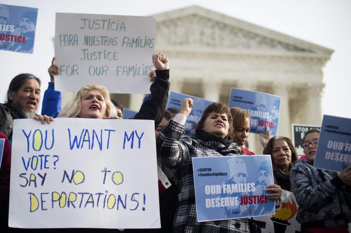 Immigration advocates rally outside the Supreme Court in Washington, DC on Jan. 16.