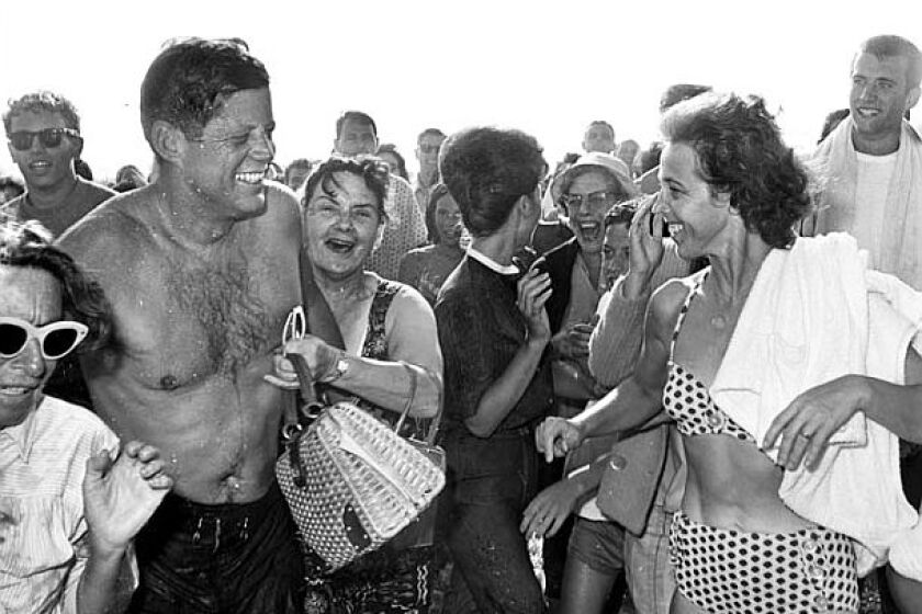 President John F. Kennedy in iconic beach photo taken by Times photographer Bill Beebe in 1962.