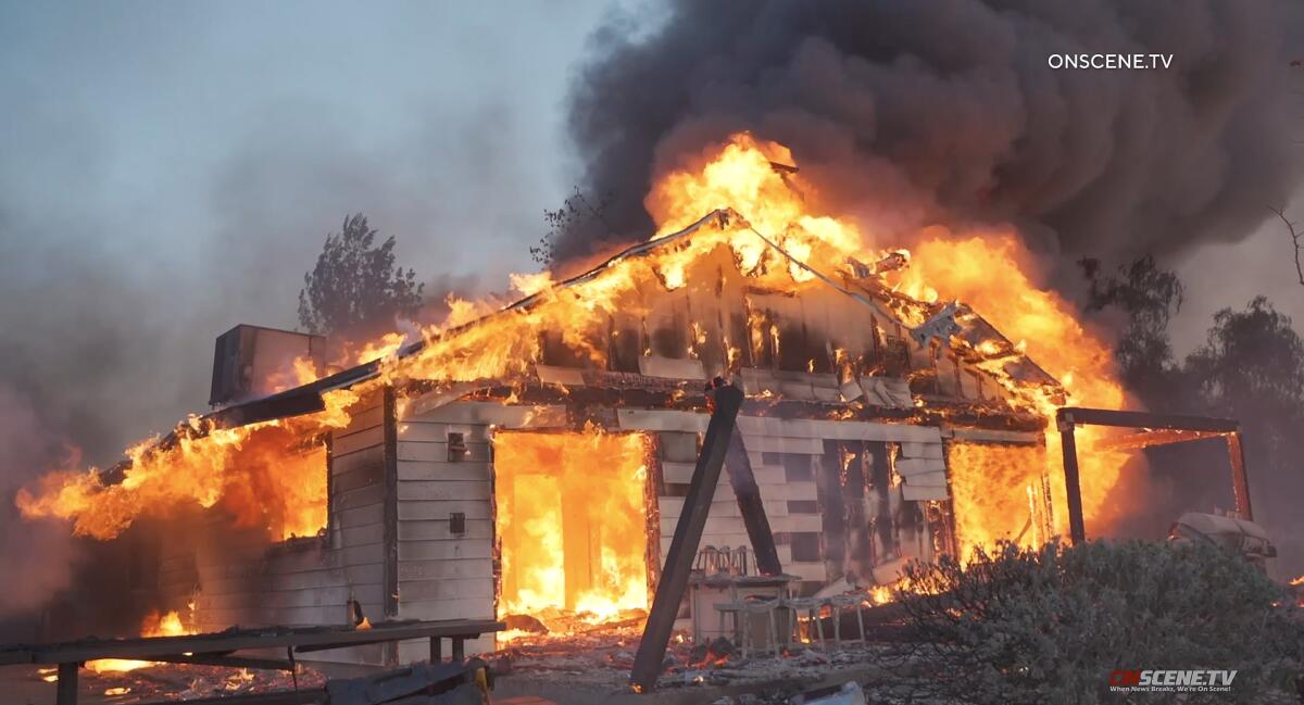 A home goes up in flames.