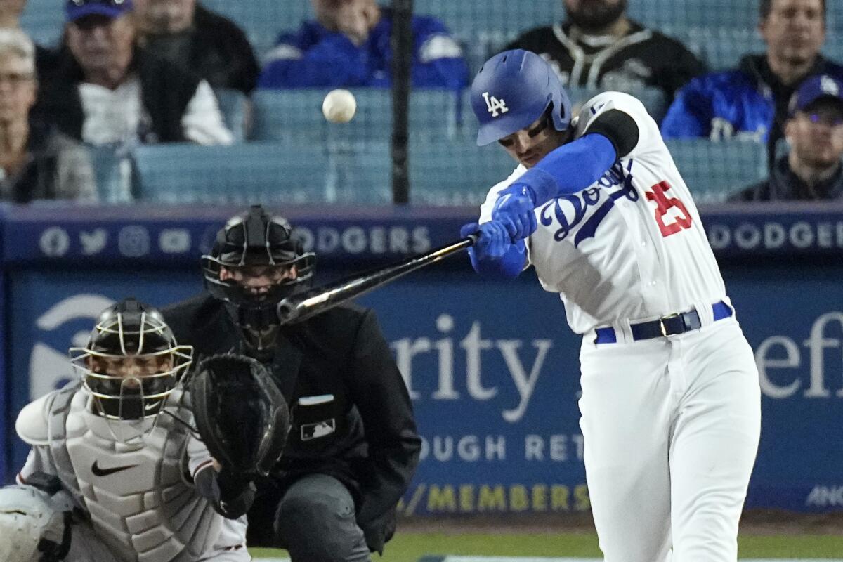 Trayce Thompson hits a solo home run during the eighth inning of the Dodgers' 10-1 win.