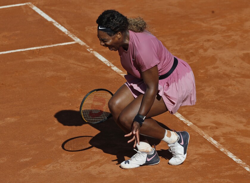 Serena Williams of the United States shouts during her match against Nadia Podoroska of Argentina at the Italian Open tennis tournament, in Rome, Wednesday, May 12, 2021. Podoroska beat Williams 7-6, 7-5. (AP Photo/Alessandra Tarantino)