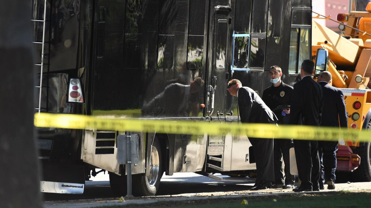 Police investigate a party bus where multiple people were shot early Saturday near the Santa Monica Pier.